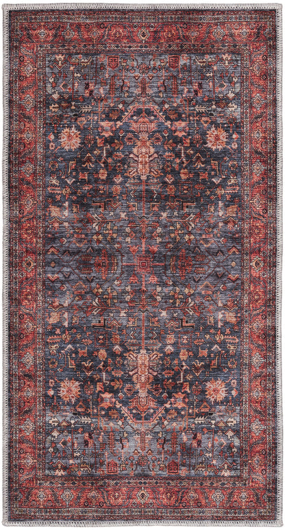 Traditional Persian-style area rug with navy blue field, red border, ornate floral medallions; fringed ends.