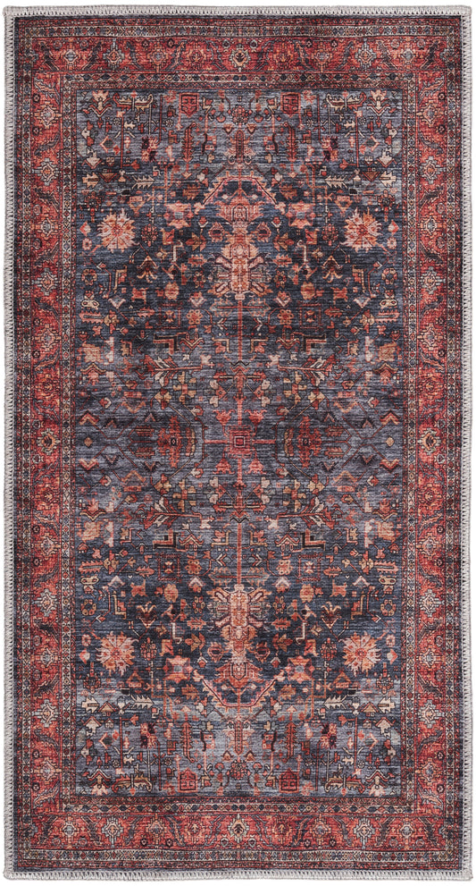 Traditional Persian-style area rug with navy blue field, red border, ornate floral medallions; fringed ends.