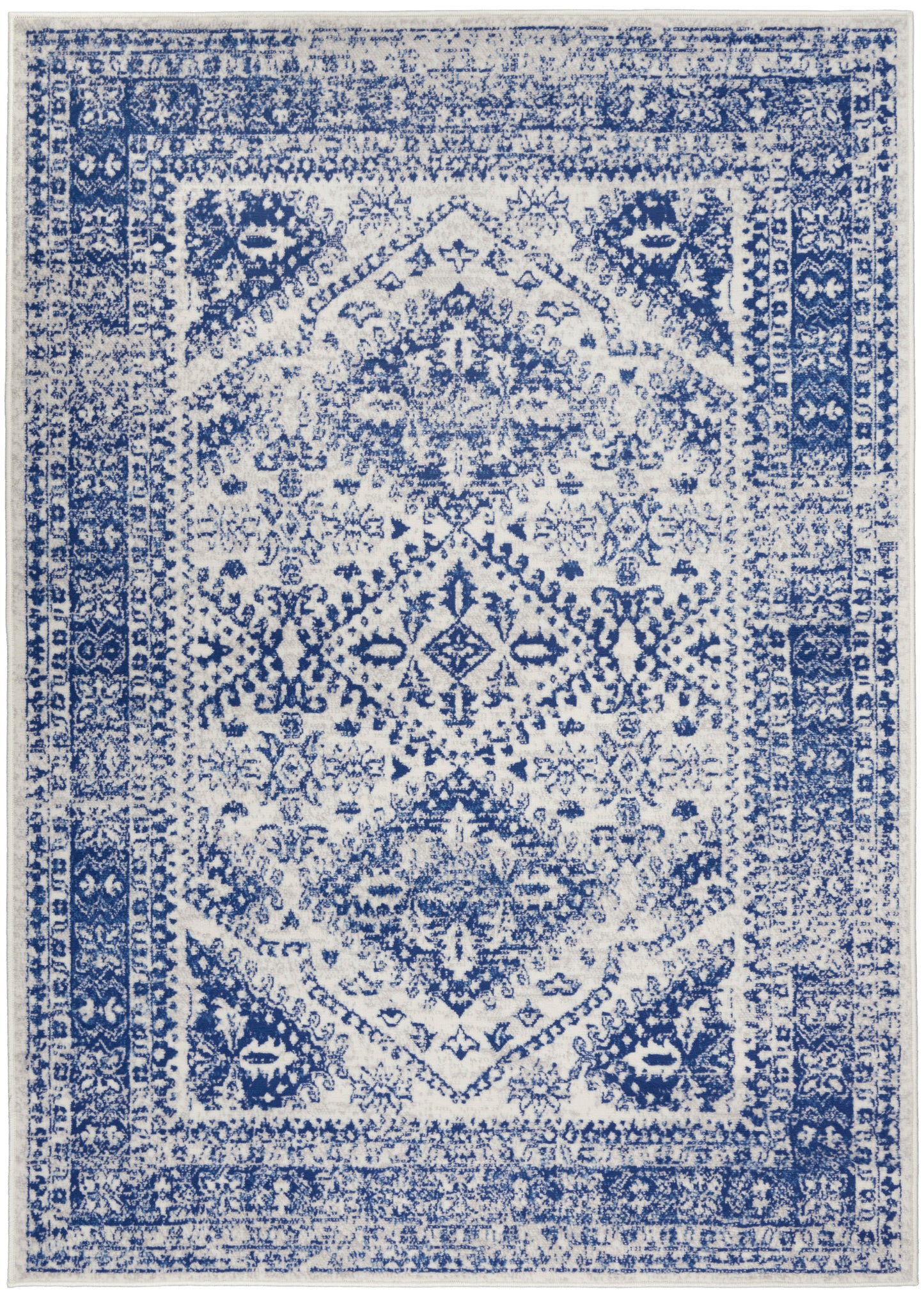 Blue & white distressed oriental rug with central medallion and ornate border; rectangular area rug.