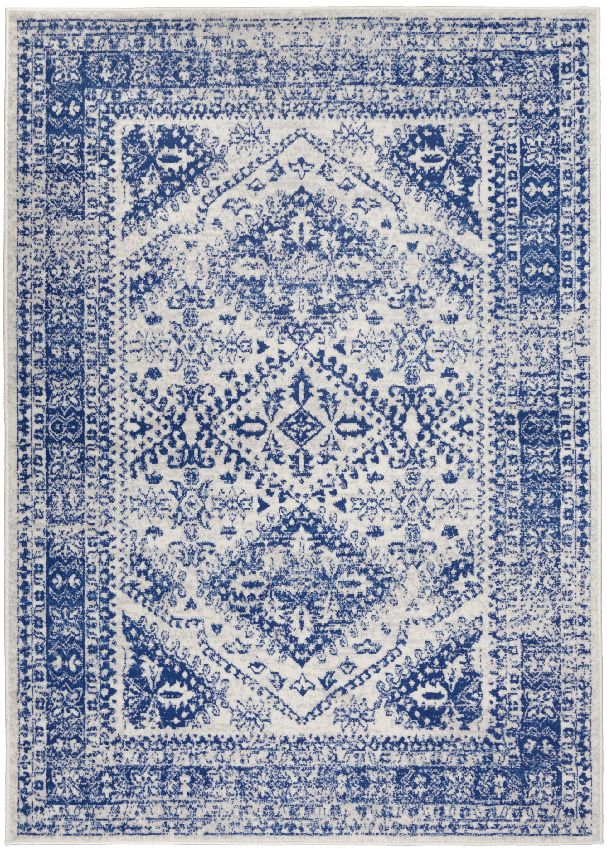 Blue & white distressed oriental rug with central medallion and ornate border; rectangular area rug.