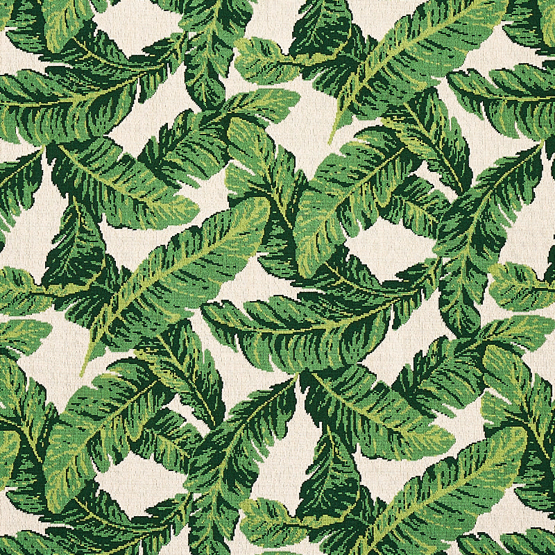 Green tropical leaf print featuring large banana-like leaves on a creamy beige background; textile pattern.