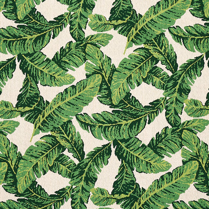 Green tropical leaf print featuring large banana-like leaves on a creamy beige background; textile pattern.
