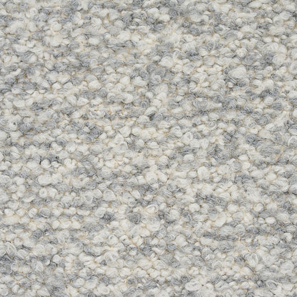 Grey and ivory speckled loop-pile carpet texture with bouclé look, soft and durable for living areas.