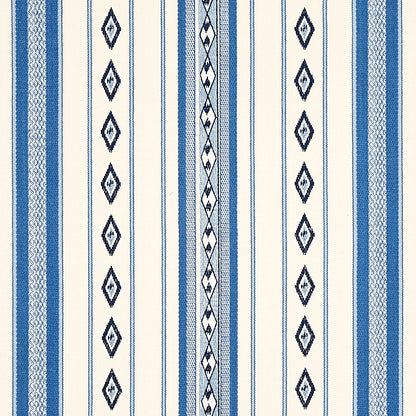 Vertical striped fabric in blue and cream with navy diamond motifs and a braided central stripe.