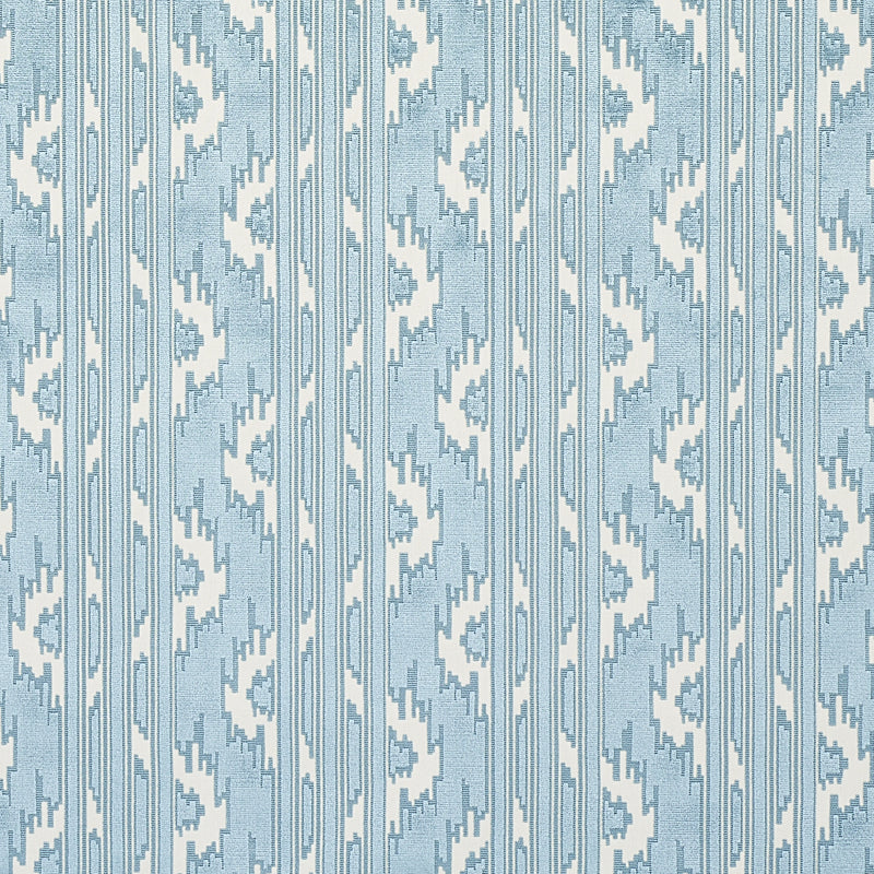 Light blue and white ikat-inspired geometric fabric pattern, vertical motifs; fabric swatch for upholstery or drapery.