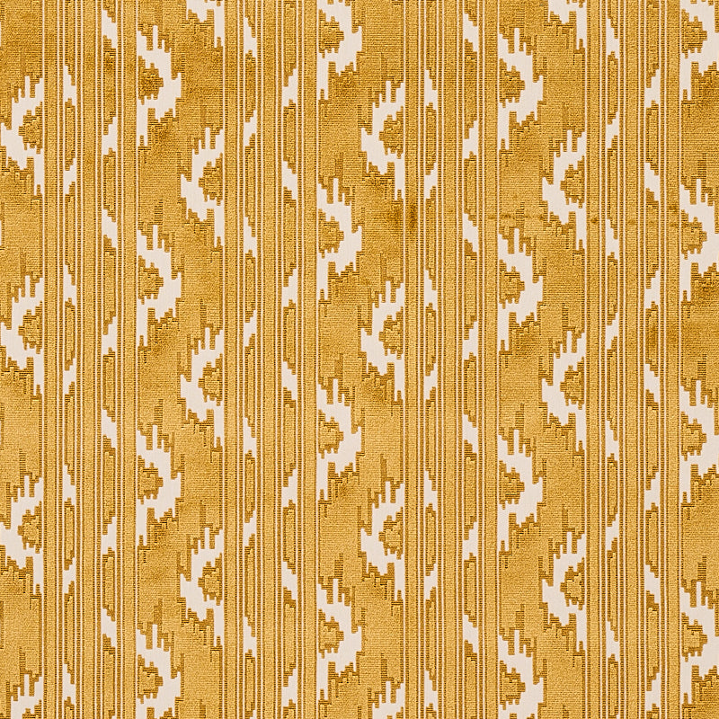 Gold and ivory ikat damask wallpaper with vertical stripes and geometric motifs for an ornate wall accent.