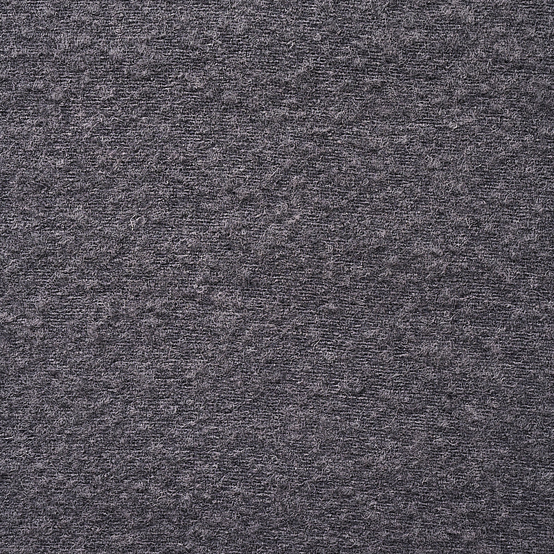 Close-up of dark grey heather knit fabric texture; soft speckled jersey for sweaters or tees.