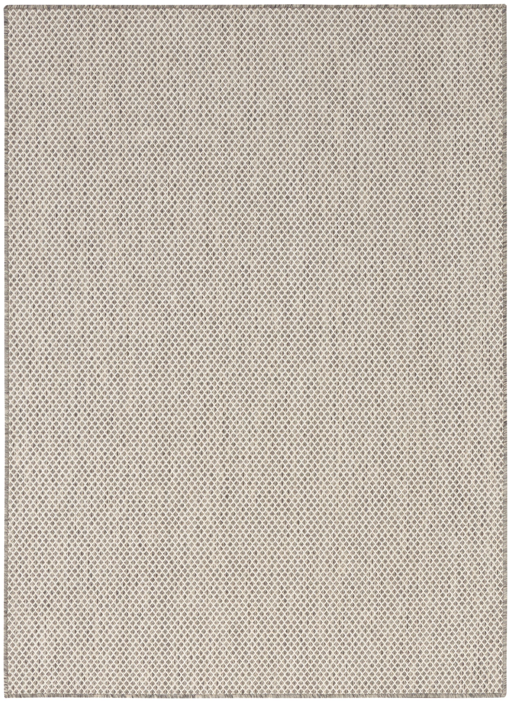 Beige woven rug with subtle diamond lattice texture; neutral flat-weave style.