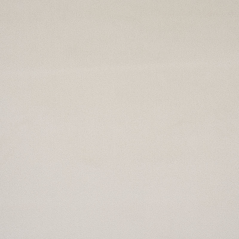 Beige textured fabric backdrop with subtle speckled grain, neutral canvas-like surface.