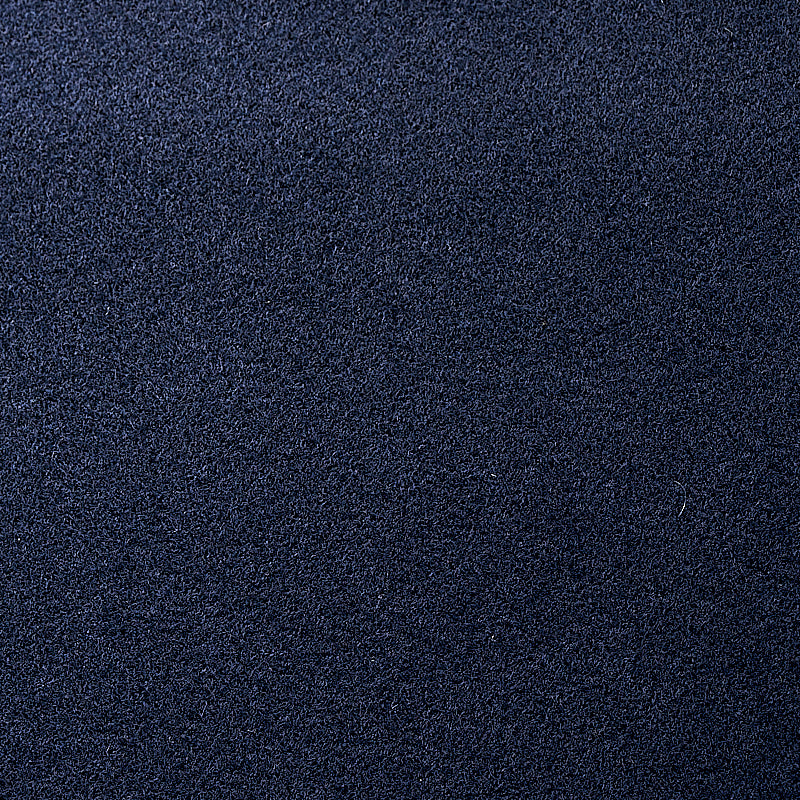 Navy blue textured fabric close-up with a soft velvety nap.
