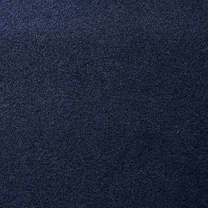 Navy blue textured fabric close-up with a soft velvety nap.
