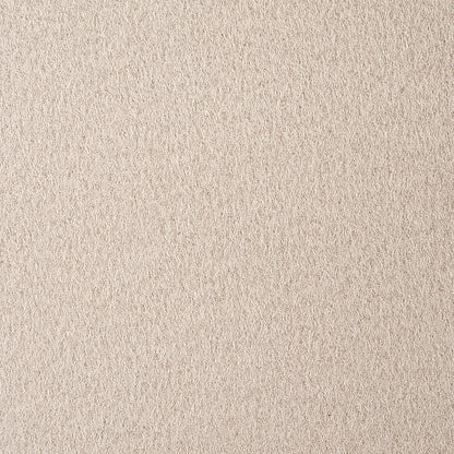 Beige suede-textured fabric surface with soft nap, neutral warm background.