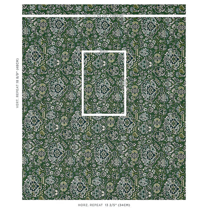 Dark green wallpaper with intricate cream and pale-blue damask floral pattern in a repeating ornate motif.