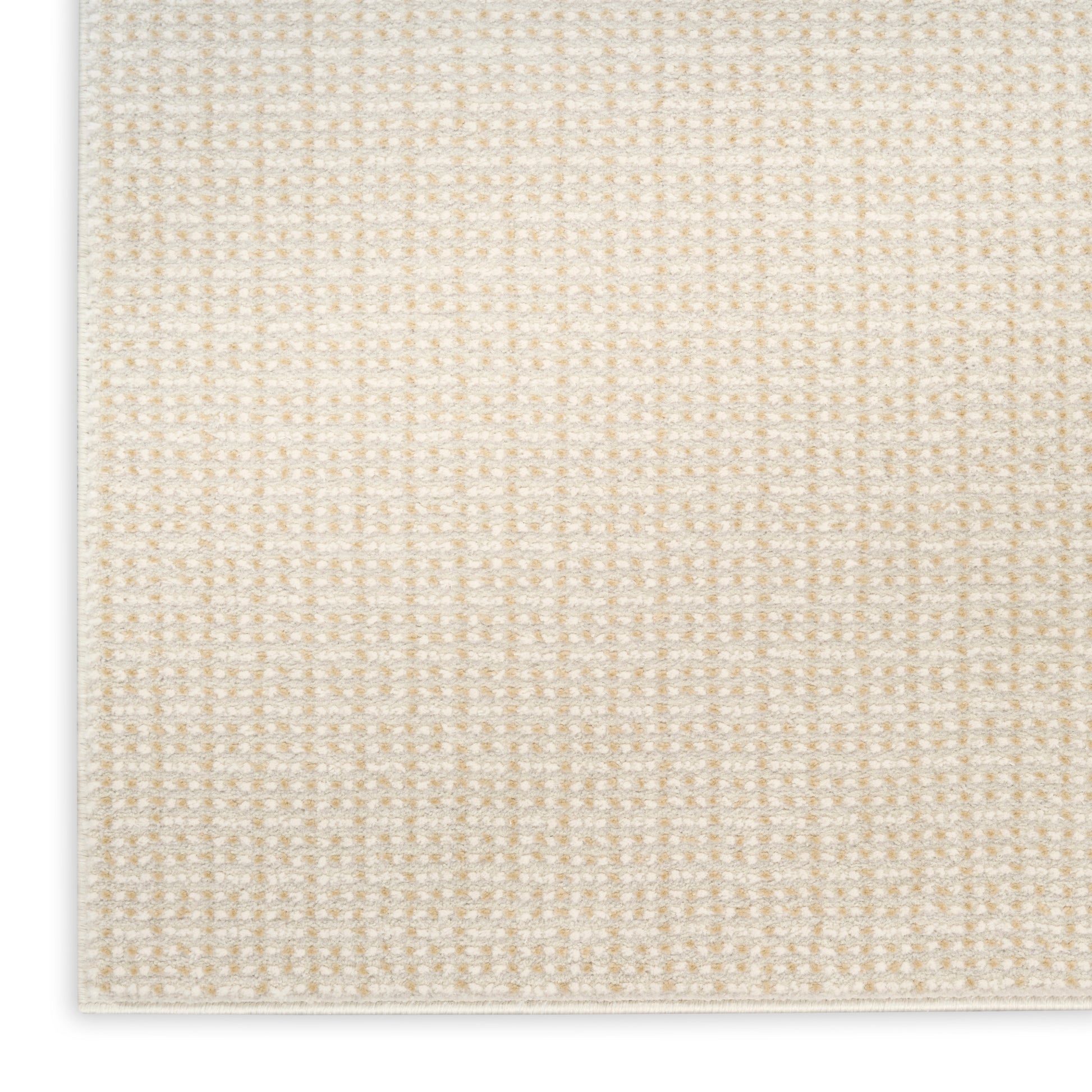 Beige woven rug close-up with subtle grid pattern and white edge.