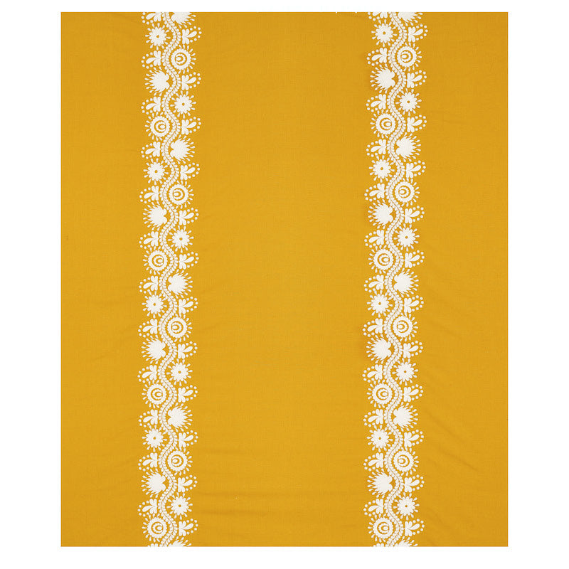 Rectangular mustard yellow textile with white lace-like vertical floral borders on both edges; boho table runner.
