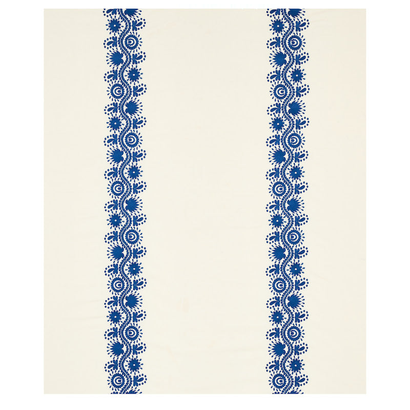 Cream fabric with two vertical blue embroidered stripes featuring floral circular motifs.