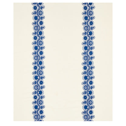 Cream fabric with two vertical blue embroidered stripes featuring floral circular motifs.
