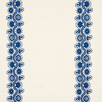 Cream fabric with two navy blue floral lace borders along both edges; vintage decorative border pattern.