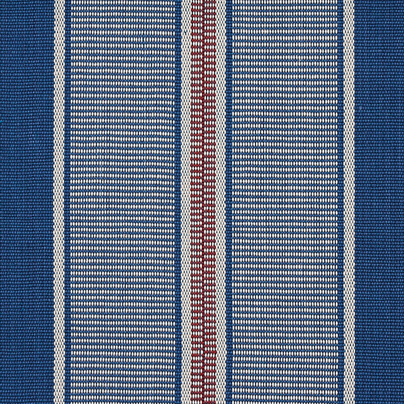 Close-up blue woven fabric with vertical stripes: dark blue sides, white pinstripes, and a central red stripe.