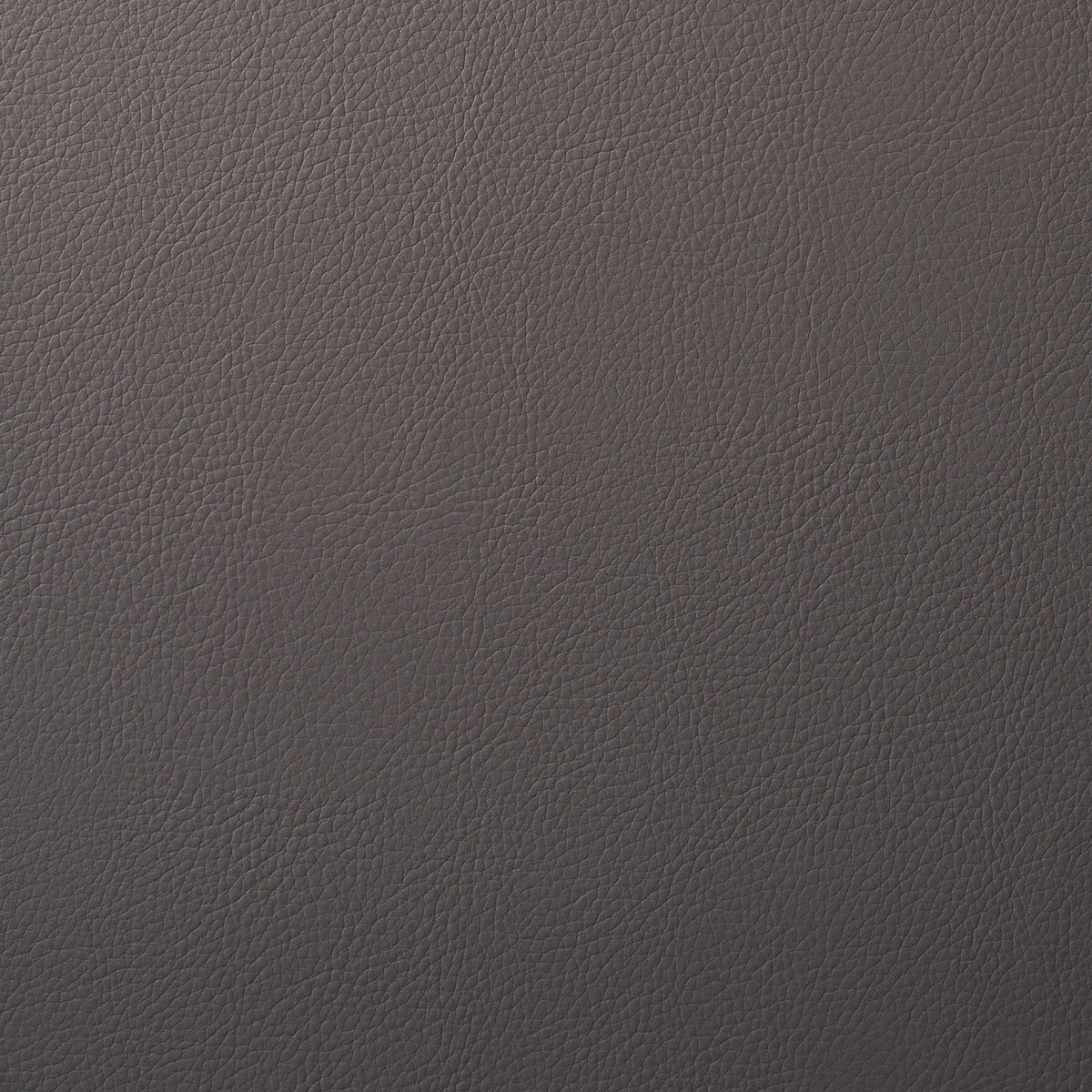 Close-up of dark brown leather with fine pebbled grain and subtle color variation.