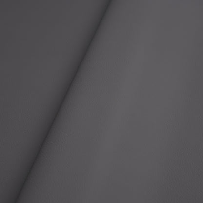 Charcoal grey pebbled leather with diagonal seam, premium upholstery texture.