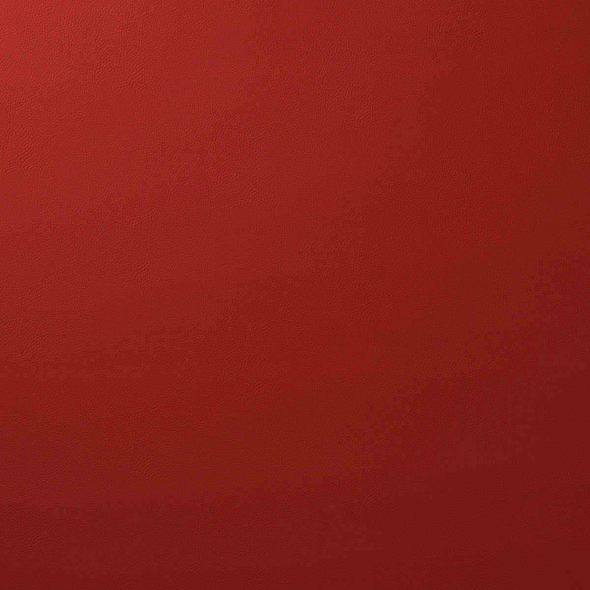 Red textured surface with fine grain, leather-like finish.