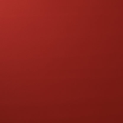 Red textured surface with fine grain, leather-like finish.