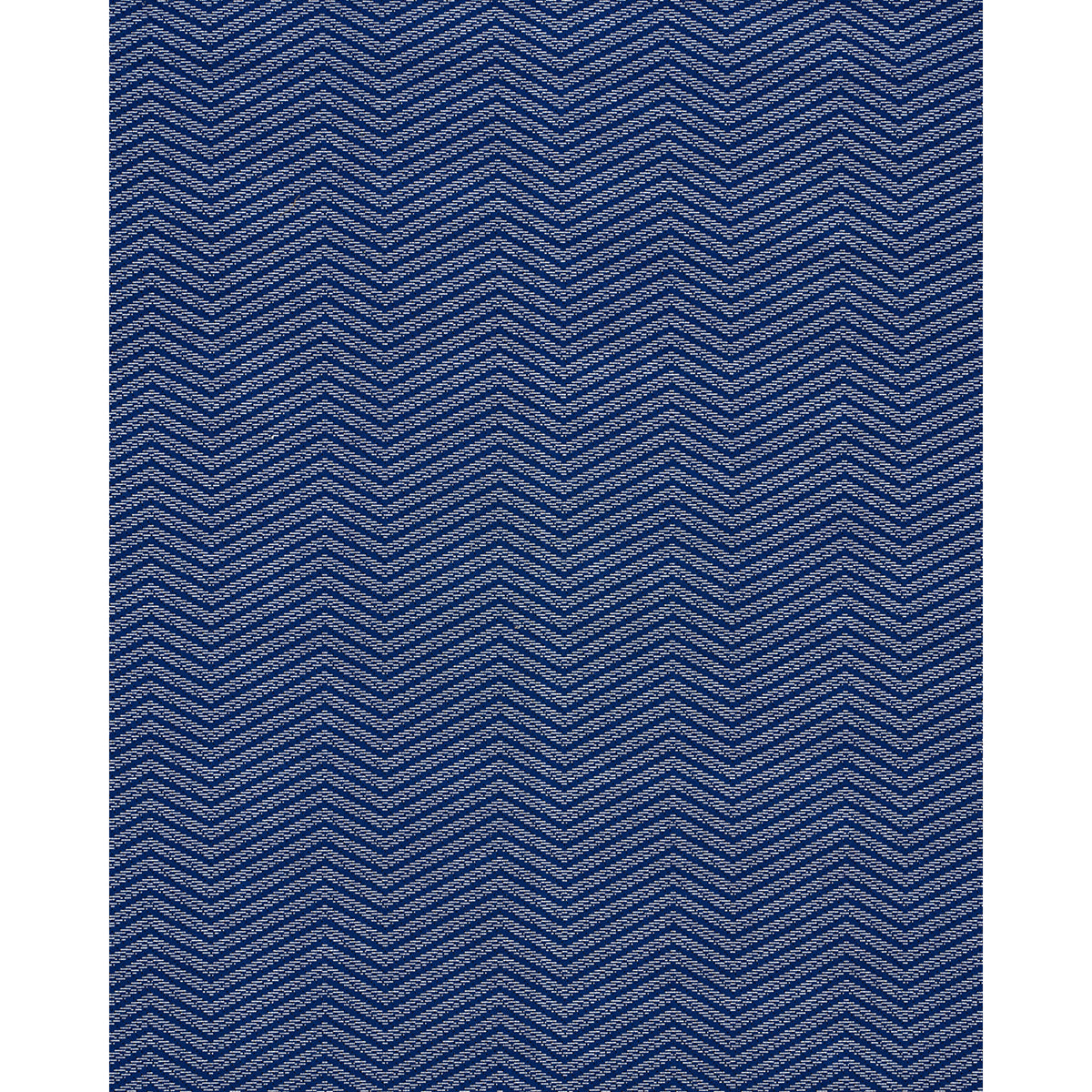 Blue herringbone fabric with chevron zigzag pattern; denim-like texture for upholstery or clothing.