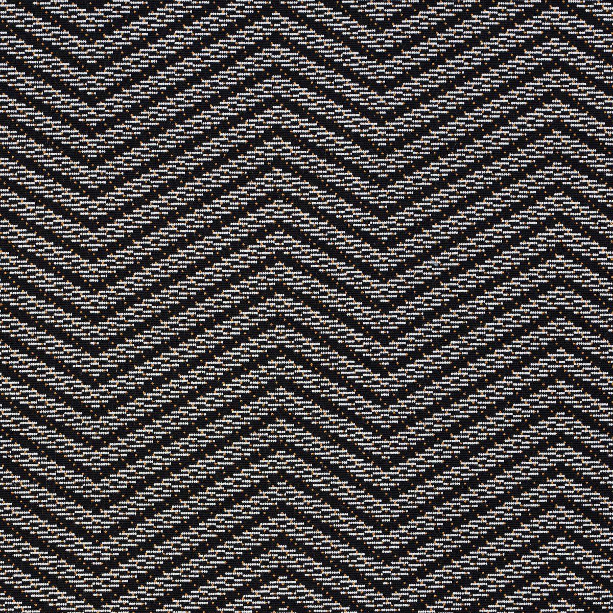 Dark charcoal woven fabric with black and light gray chevron zigzag pattern and textured weave.