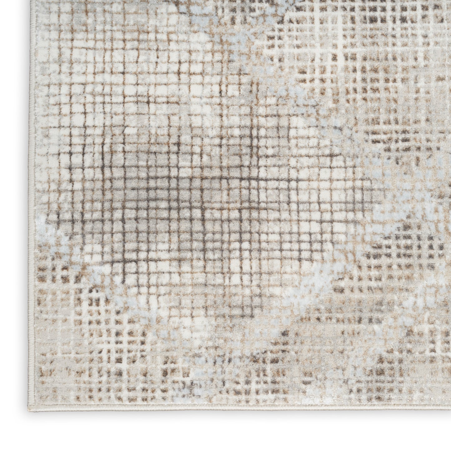 Beige and cream abstract woven area rug with a distressed grid pattern and muted gray accents.