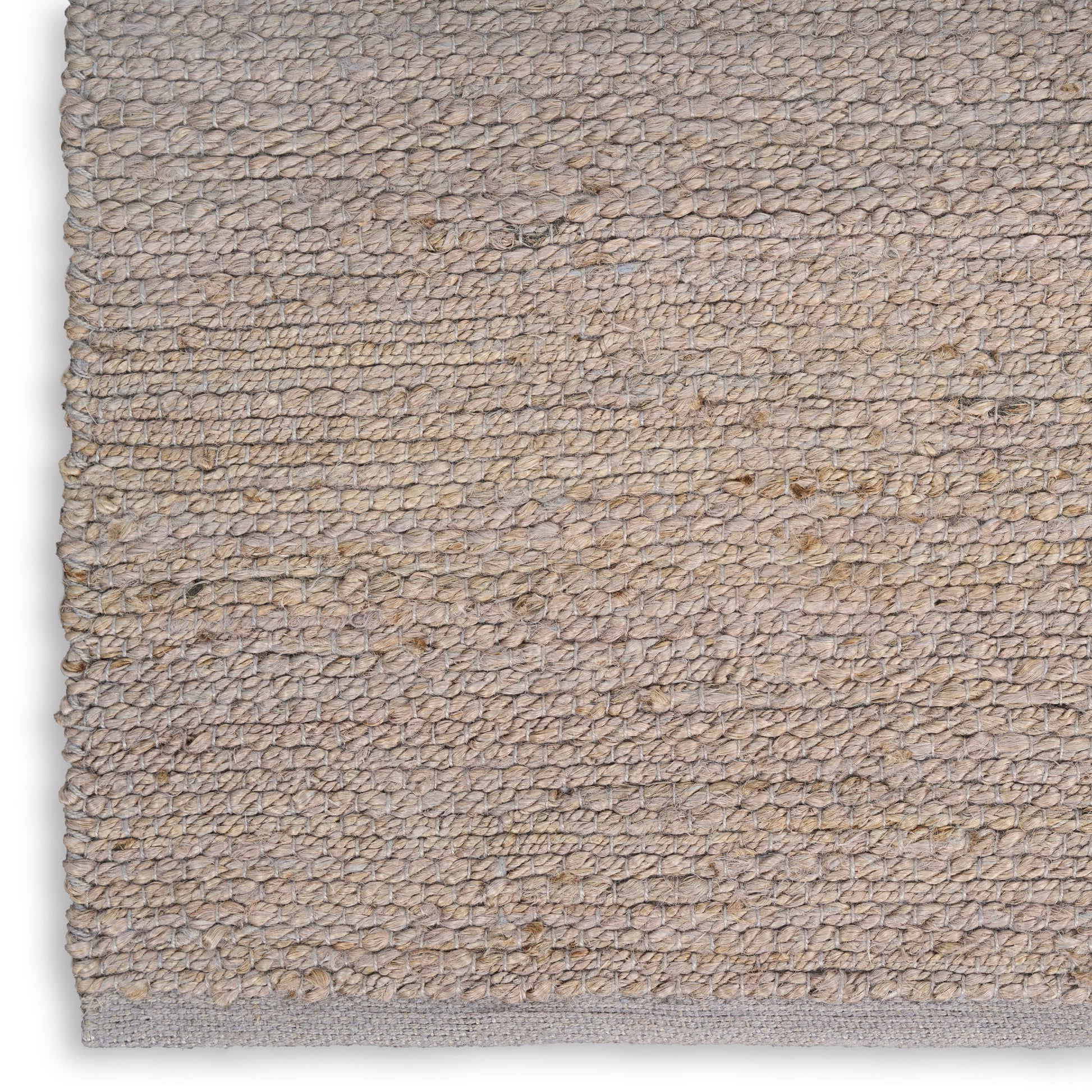 Beige natural-fiber loop-pile rug with subtle texture and grey backing along edge.