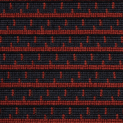 Dark navy woven fabric with red dotted horizontal stripes; textured textile for upholstery.