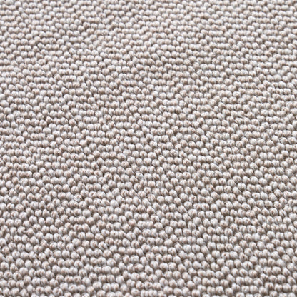 Beige loop-pile carpet close-up with tight, uniform textured fibers for neutral flooring.