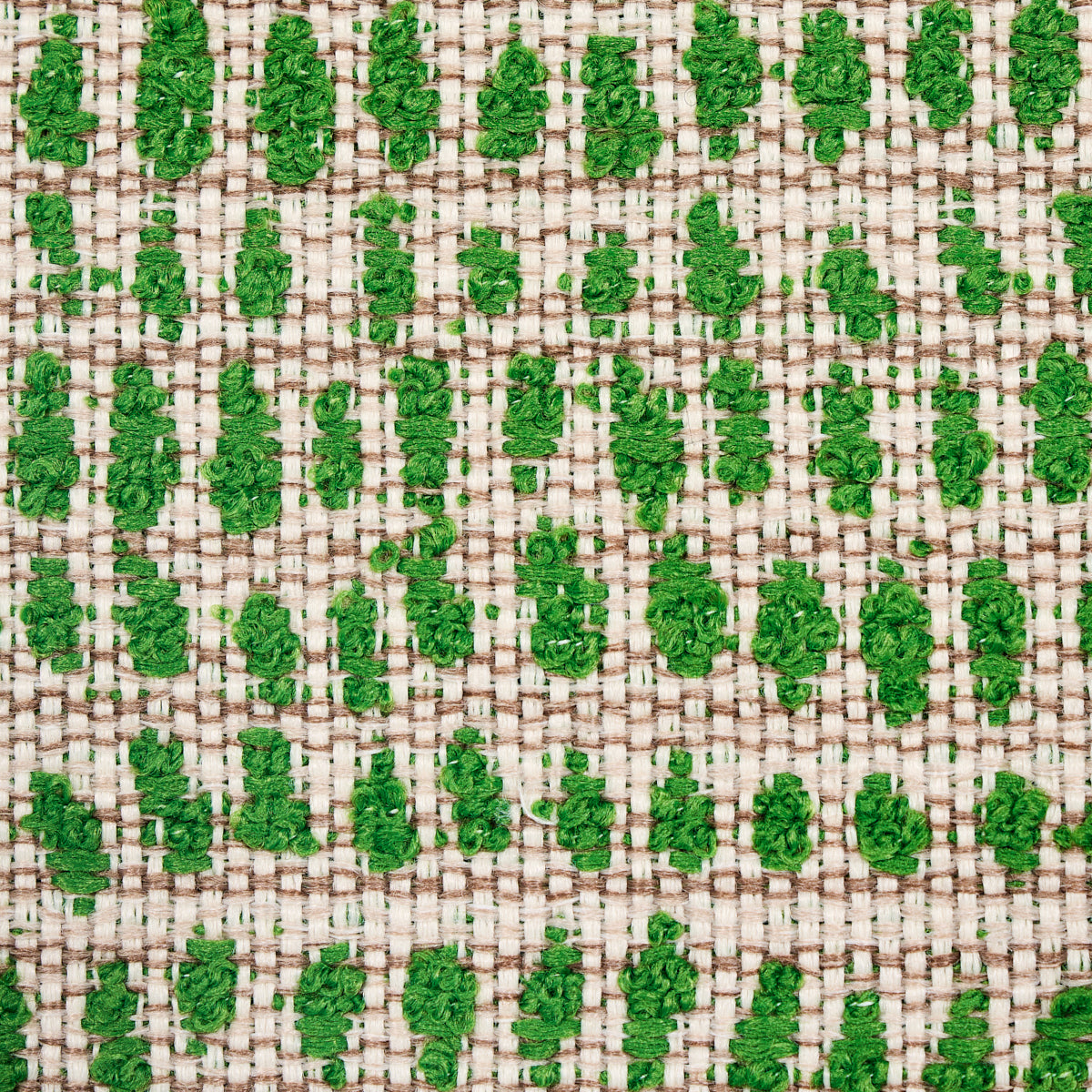 Beige indoor/outdoor woven fabric with emerald green leaf motif created by tufted stitches.