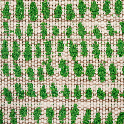 Beige indoor/outdoor woven fabric with emerald green leaf motif created by tufted stitches.