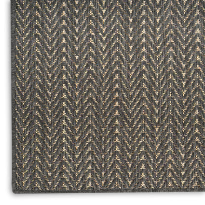 Dark gray chevron woven runner rug with beige speckled threads; rectangular textured rug for hallways or living spaces, 6' runner.