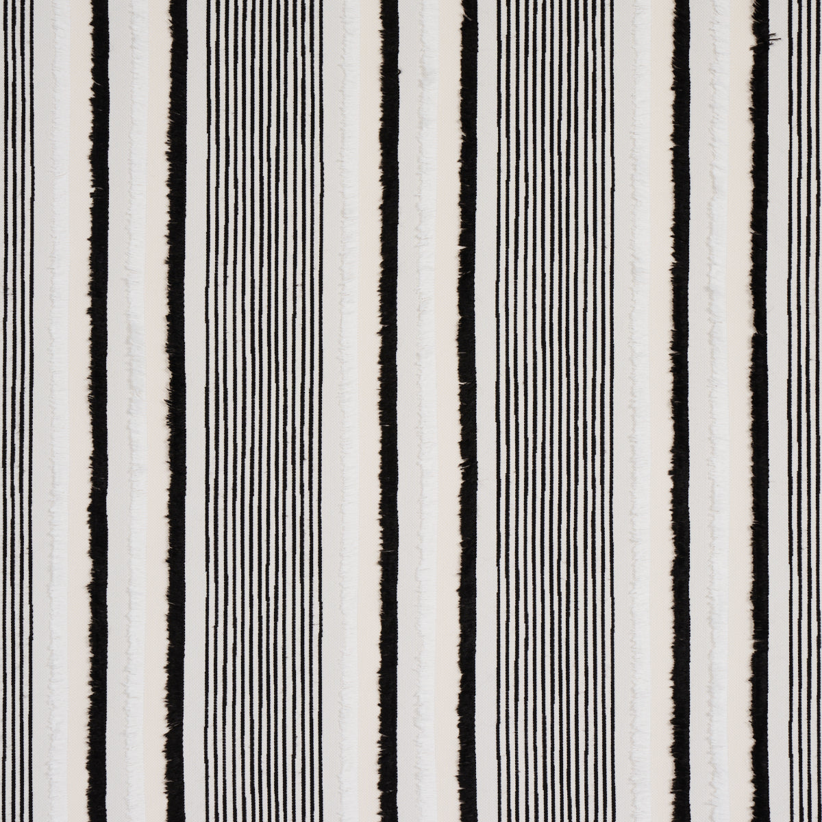 Vertical black-and-white stripe pattern with bold and fine lines; modern graphic fabric print.