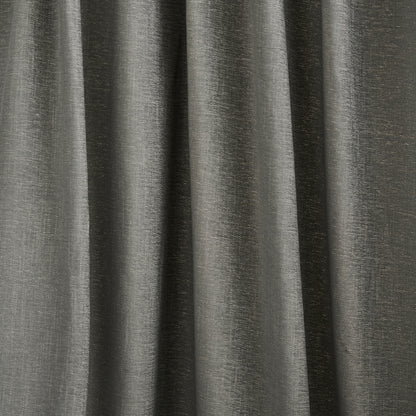 Charcoal gray curtain fabric with vertical folds and subtle sheen.