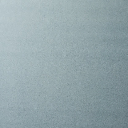 Blue-gray suede-like fabric texture with a soft nap, close-up swatch for upholstery or apparel.