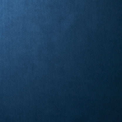 Dark blue velvet texture with subtle grain, rich navy shade for upholstery or fashion.