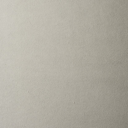 Beige textured surface with a soft matte finish; uniform color, no pattern.