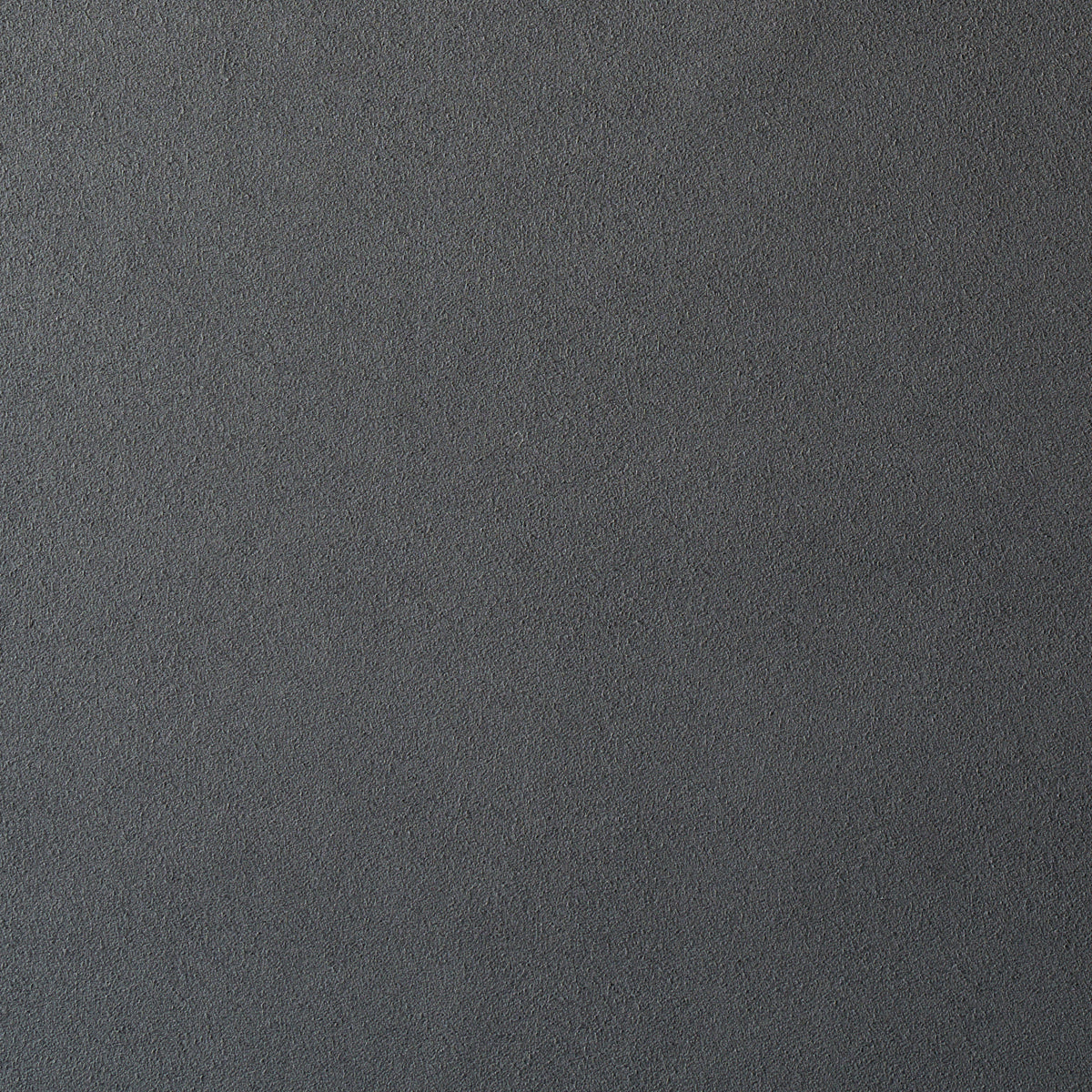 Dark gray, slate-like textured surface with subtle grain and matte finish.