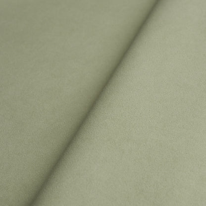Olive green suede-like fabric with a diagonal crease and soft matte texture.