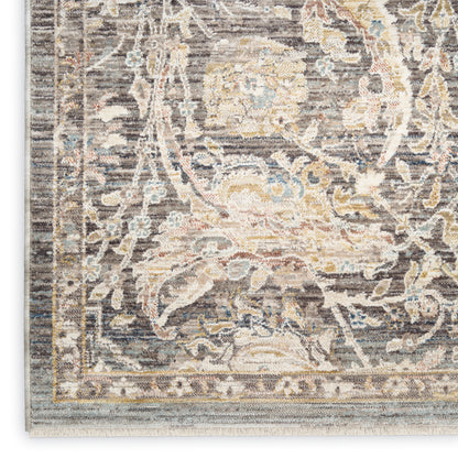 Traditional gray oriental rug with ivory, blue and pale yellow floral motifs and ornate border.