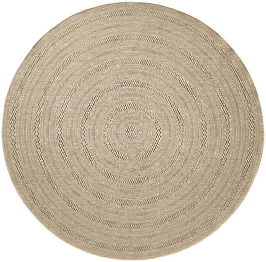 Natural beige round outdoor rug with concentric woven rings, flat and versatile.