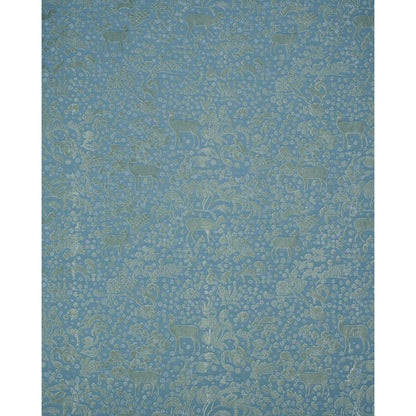 Slate blue velvet with a damask pattern and subtle gold deer and floral motifs.
