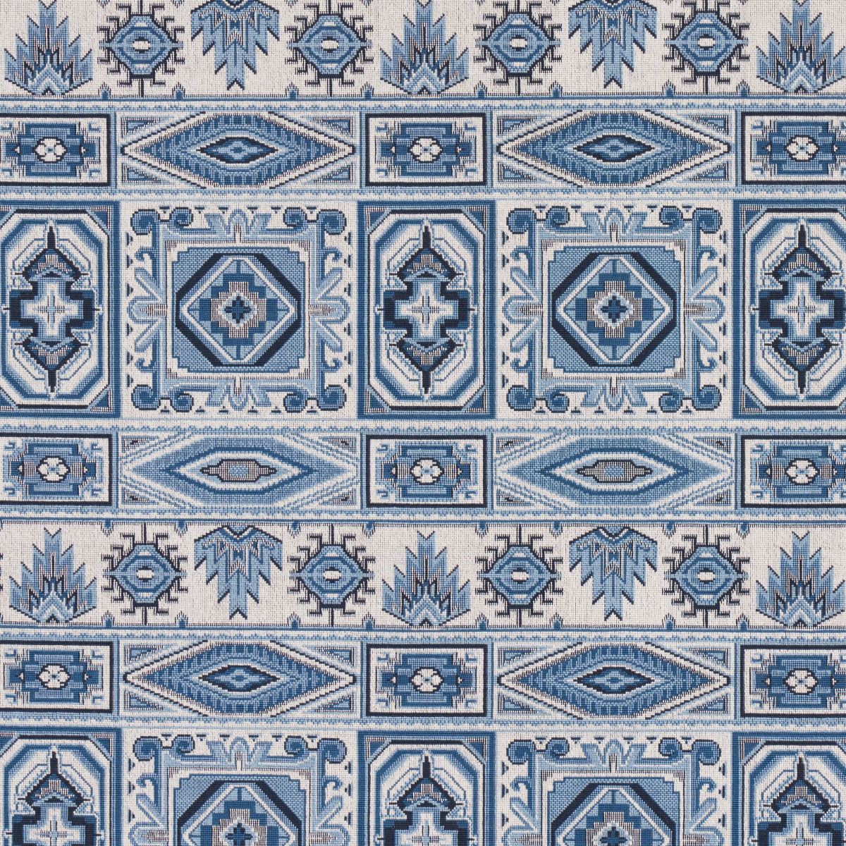 Blue and white ceramic tile pattern with geometric diamonds and ornate borders, repeating decorative tiles.