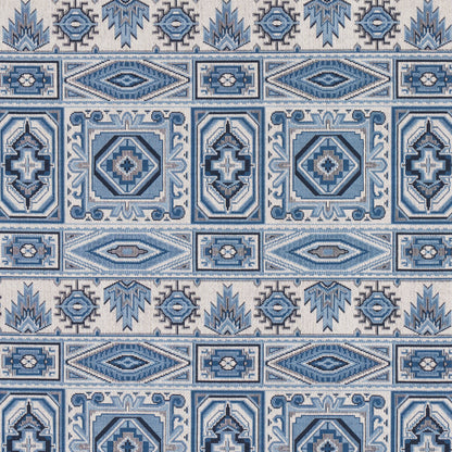 Blue and white ceramic tile pattern with geometric diamonds and ornate borders, repeating decorative tiles.