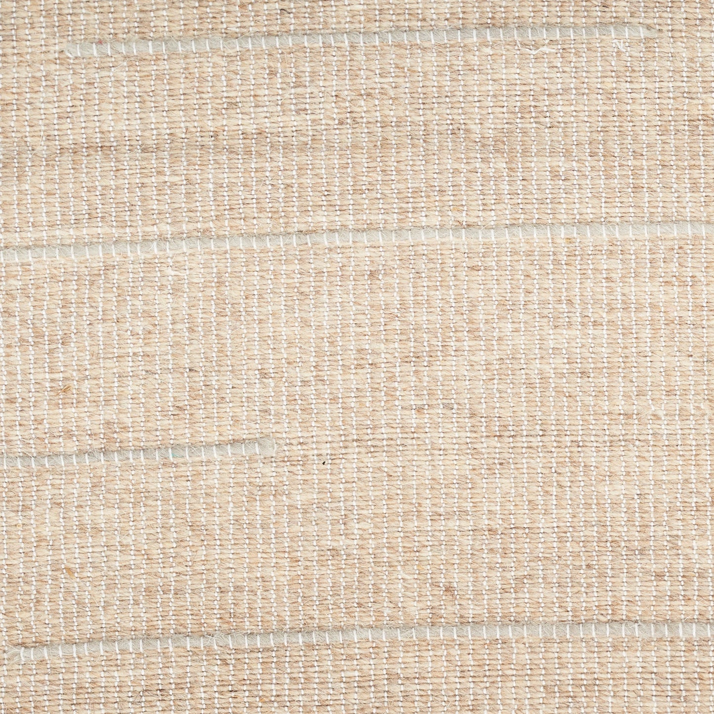 Beige woven natural-fiber rug with white thread stripes; modern flat-weave, 5' x 7'.