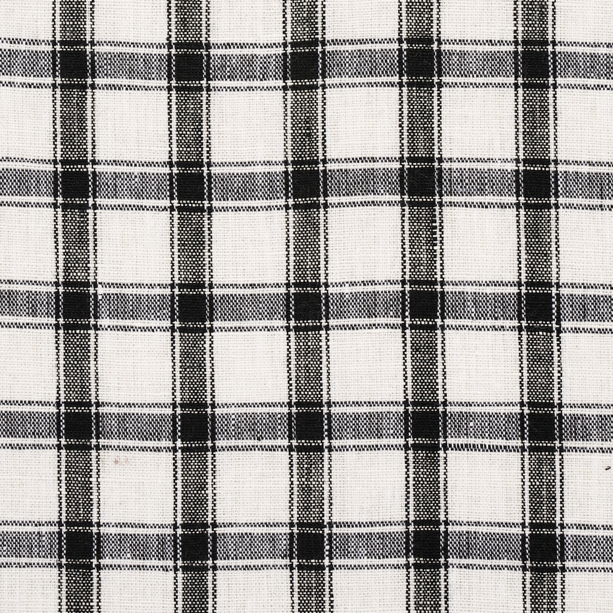 Black and white plaid woven fabric with a grid pattern, ideal for shirts or home textiles.